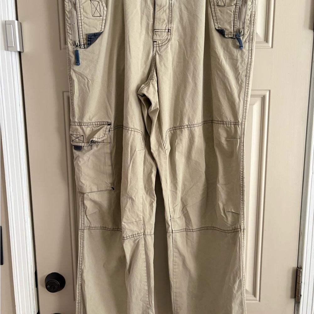 American Eagle Outfitters Men's Cargo Pants in Khaki with utility pockets.